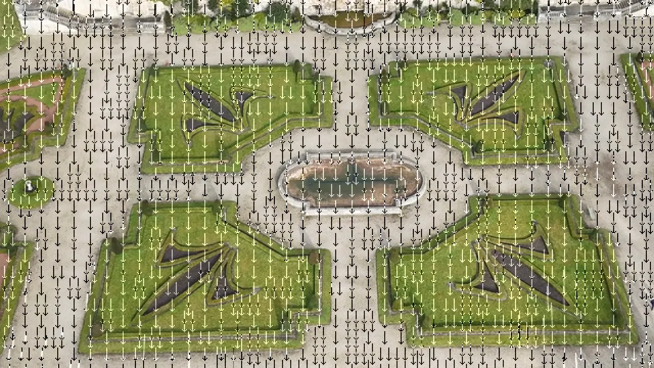Aerial view of a formal garden with hundreds of small arrows drawn over it, all pointing straight down, showing the motion vectors FFmpeg exported from one P-frame